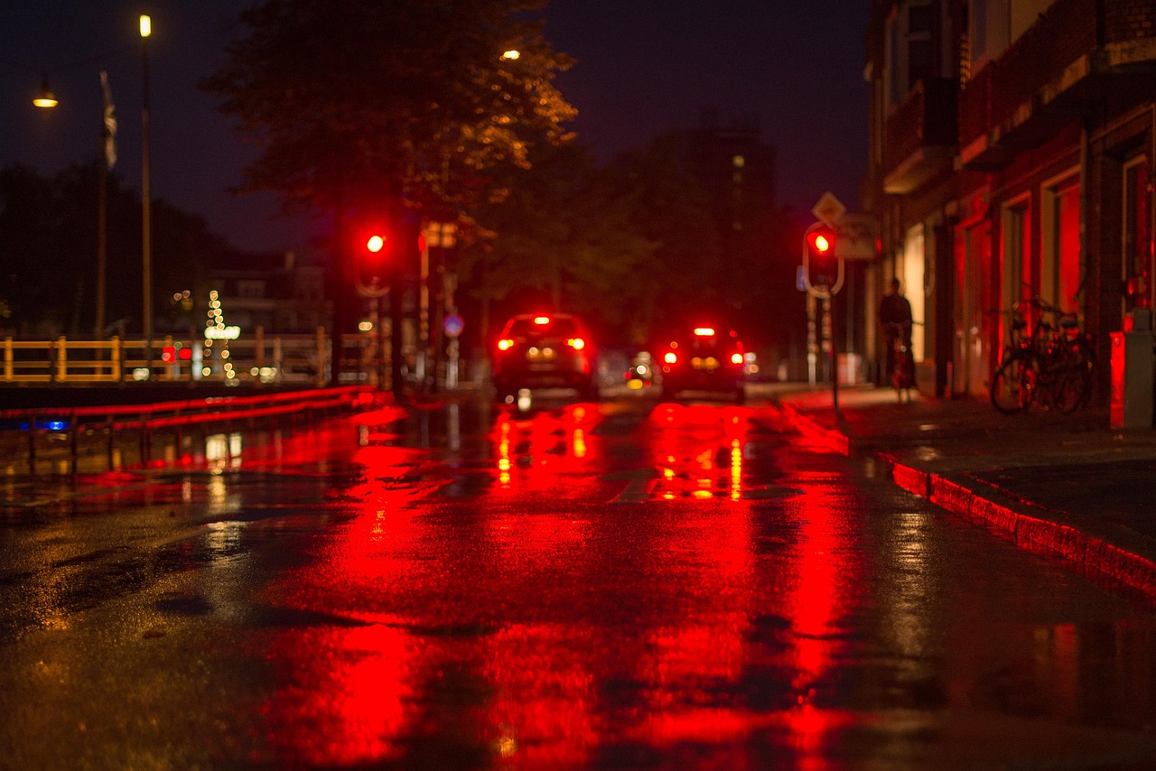 Rain-slicked street at night — the tension of a thriller