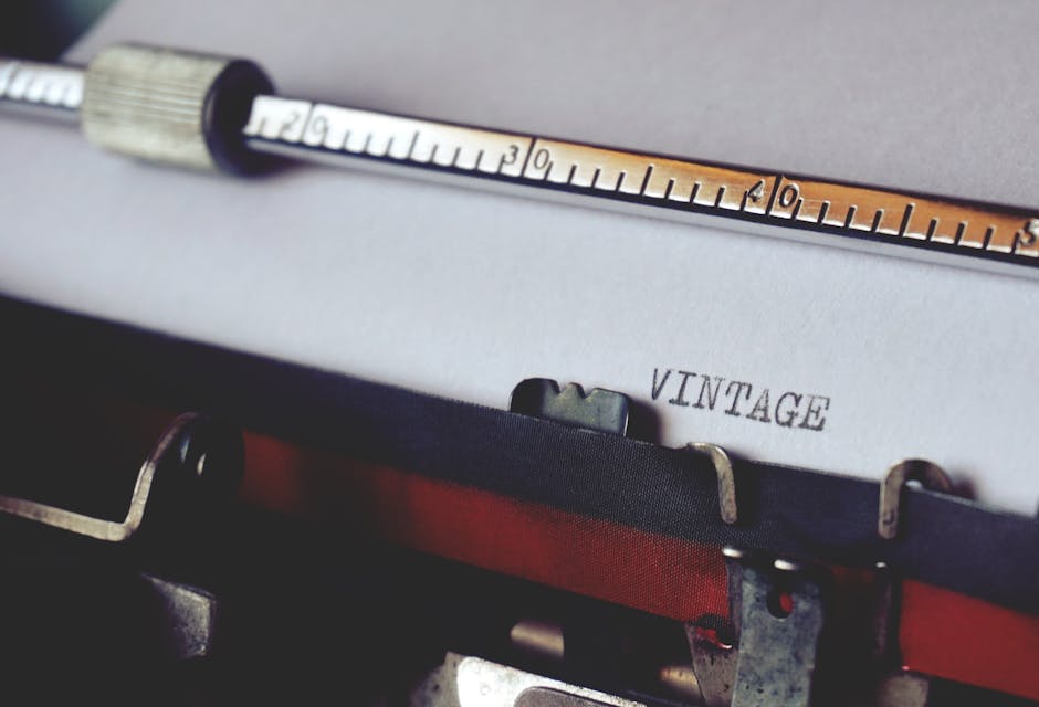 Close-up shot of a vintage typewriter typing the word 'VINTAGE'. Perfect for retro and writing themes.
